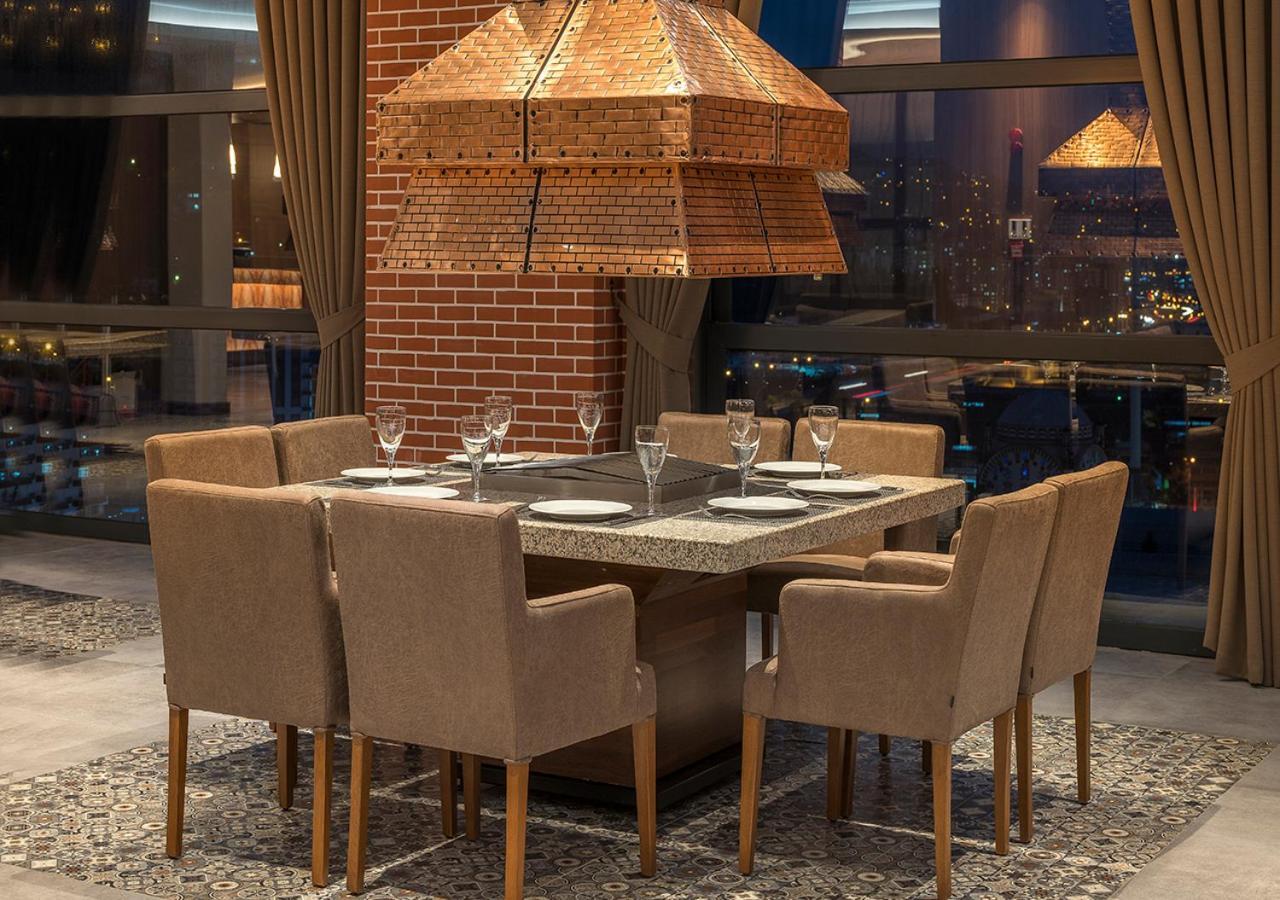 Hotel Ramada Plaza By Wyndham Rize Exterior foto The interior of the restaurant